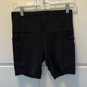 Athleta Salutation Stash Pocket II 7” Short in Black